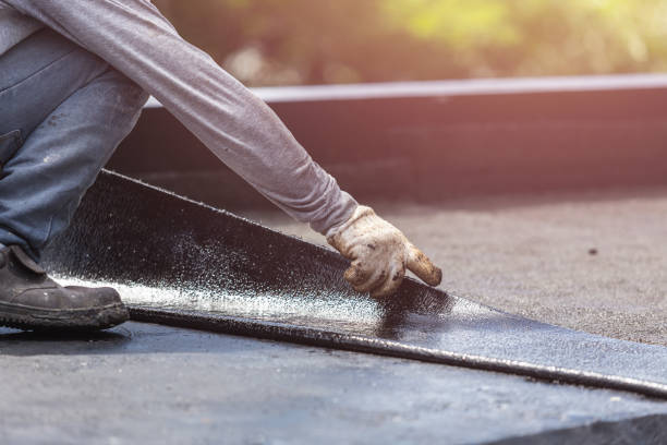 Professional Waterproofing technician working in Victoria, MN